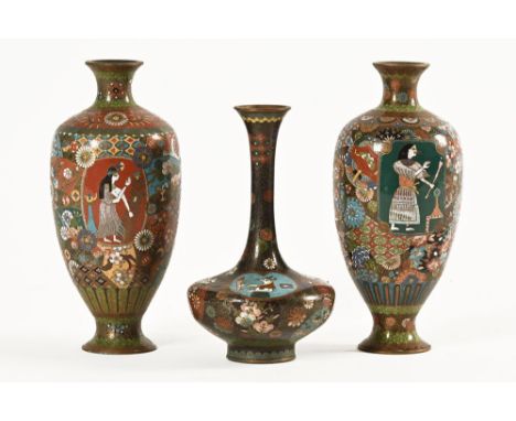 Three cloisonne vases, the near pair with Egyptian panels as well as traditional Japanese design. Height 21 and 21.5 cm toget