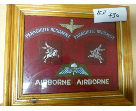 Collectables:  Frame WWII set of Parachute Reg and badges, good cond.