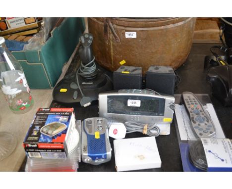 A pair of speakers; a Roberts radio alarm clock; an as new Sky tv remote etc. 