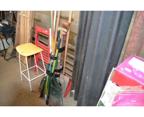 A quantity of long handled gardening tools 