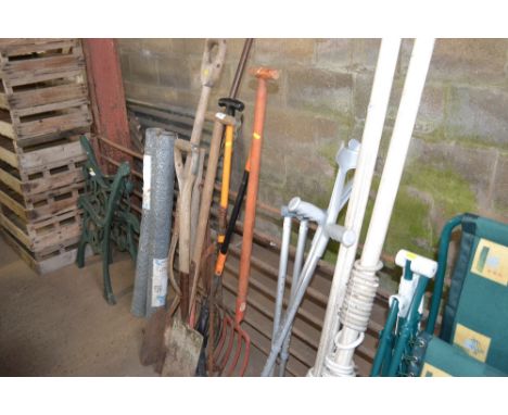 A quantity of long handled gardening tools 