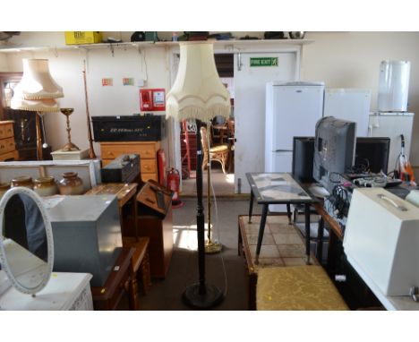 A turned standard lamp