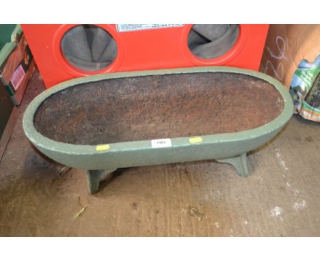 A cast iron painted trough 