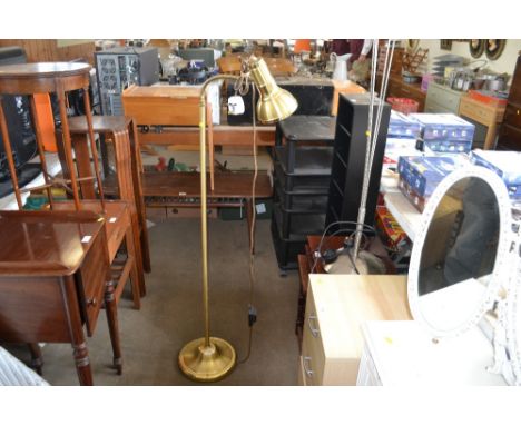 A floor standing reading lamp