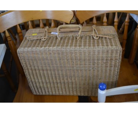 A wicker picnic hamper 