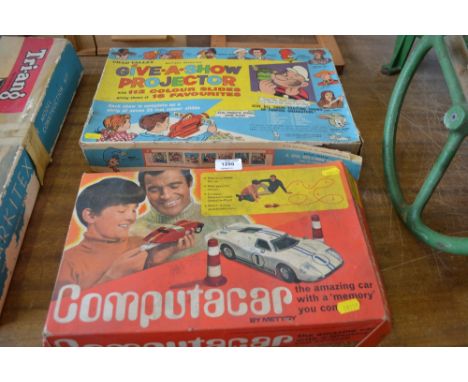 A Chad Valley, Give A Show projector in original box; together with a Computa Car in original box