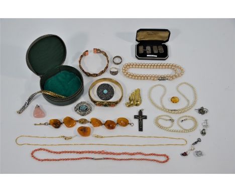 A collection of antique and vintage jewellery including coral bead necklace, two rows of pearls, gilt metal bangles, rose qua