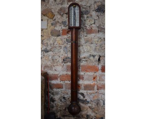 A mahogany stick barometer, with brass mounts, mercury thermometer and ivory scales, by G &amp; C Dixey, 'Opticians to the Ki