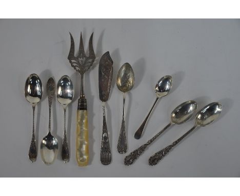A small quantity of silver, including bread fork with mother of pearl handle, Sheffield 1900, various teaspoons and a butter 