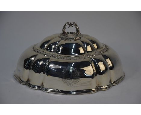 A good quality Victorian silver meat dome of lobed oval form, the detachable handle cast as armorial crest with lions' paws h