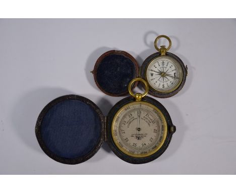 A 19th century gilt brass pocket barometer with silvered dial, J H Steward Ltd, Strand, London, in morocoo case, to/w a simil