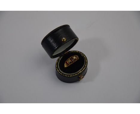 An antique 18ct yellow gold five stone gypsy ring set with three rubies and two diamonds, inscribed within AL to HRB 16/4/15 