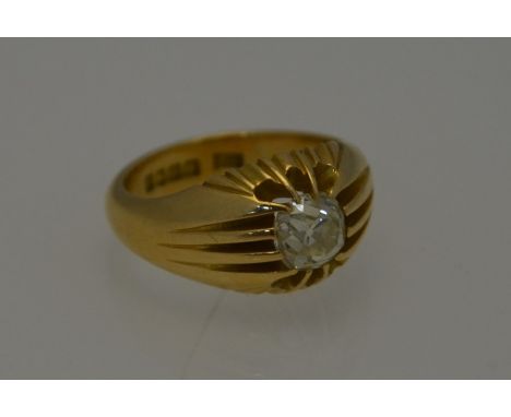 A single stone old cut diamond gypsy ring, the 18ct yellow gold shank with pierced and carved claw setting, size P/Q, approx 