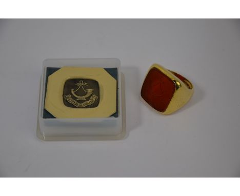 A large 18ct yellow gold signet ring with cornelian intaglio featuring masonic crest, size L, head 2 x 1.8 cm, approx 15.8g a