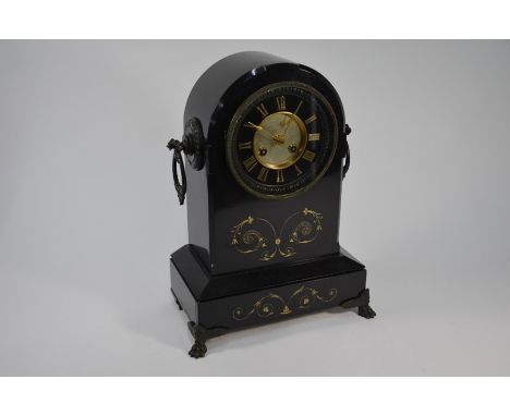 A late 19th century slate mantel clock, the gilt decorated dome top case with 8-day two train Marti &amp; Co movement strikin