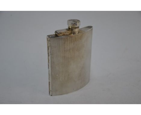 An engine-turned silver hip-pocket flask with hinged bayonet top, Mappin &amp; Webb, Birmingham 1936, 5.6oz, 13 x 9 cmGood&nb