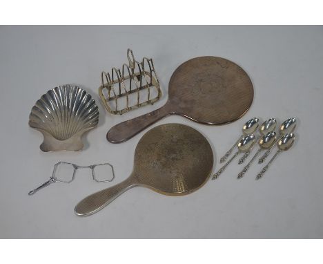 An Edwardian silver Gothic revival toast rack, William Hutton &amp; Sons Ltd, London 1906 and a set of six coffee spoons with