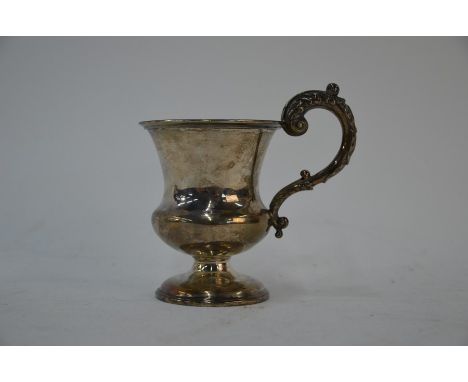 A three handled silver trophy cup of waisted form, T H Hazlewood &amp; Co, Birmingham 1911, 6.7oz, 10cm high - later engraved