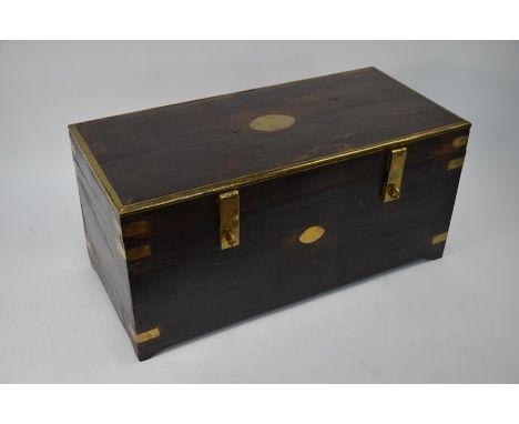A brass bound hardwood trunk, 61 x 31 x 31 cm high