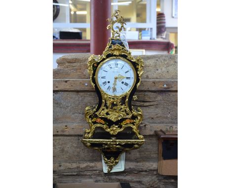 A reproduction French floral decorated black lacquer and gilt brass mounted bracket clock, the eight day two train movement s
