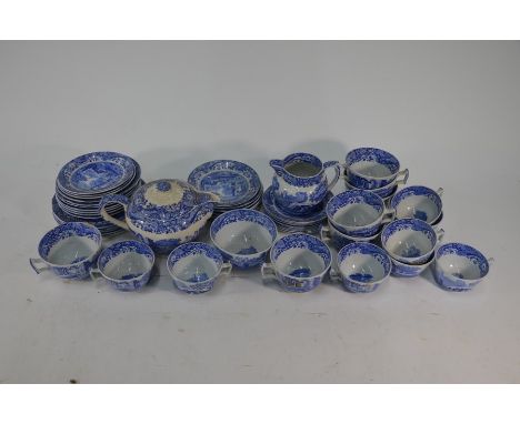 A Spode Italian pattern tea service comprising teapot, milk and sugar, five 19 cm plates, seven 16 cm plates, eight large tea