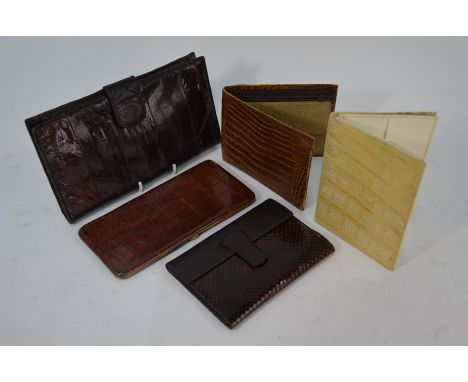 Five various vintage and earlier leather cigarette cases, wallets etc