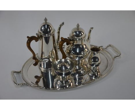 Asprey & Co. Ltd: a heavy quality silver pear-shaped three-piece tea service in the Georgian manner, to/w a plain tapering co