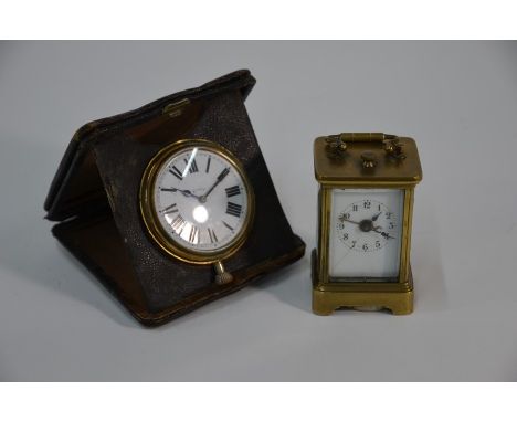 A vintage Swiss movement fob watch to/w a miniature brass travel carriage alarm clock, 7.5 cm high, both a/f (2)