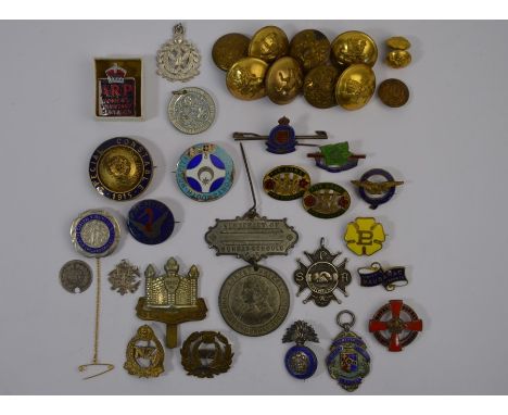 A collection of enamel and gilt metal badges, including Special Constable, Royal Portsmouth Hospital, Hammersmith Football 'L
