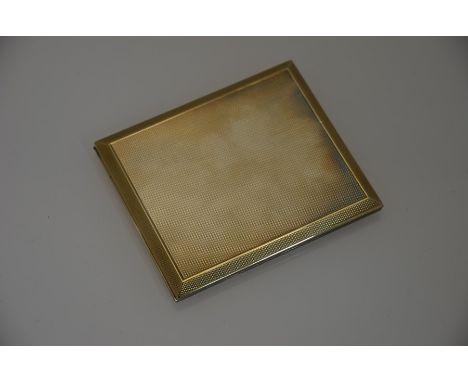 Aspreys - A rectangular engine-turned silver gilt cigarette case, approx 147.3g, London 1955, 9.5 x 8 cm