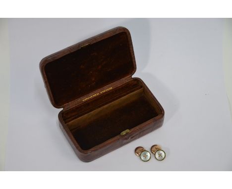 A pair of Edwardian 9ct rose gold chain linked cufflinks with green and white enamel decoration in the form of buttons, to/w 