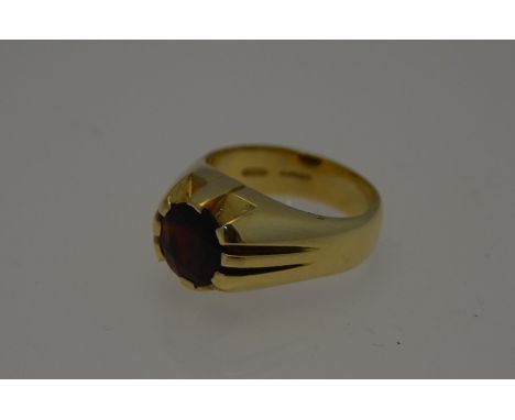 A 15ct yellow gold ring with circular claw set garnet, size O, approx 15.2g all in