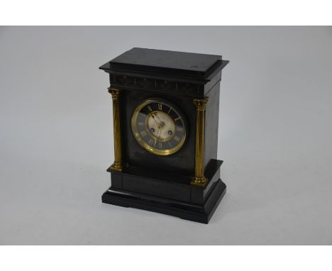 A late 19th century gilt-metal mounted slate mantel clock, the eight day two train movement by Marti &amp; Co, striking the h