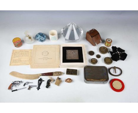 A group of collectors' items, including a treen inkstand incorporating a pen wipe, designed as a coal scuttle, a brass box, d
