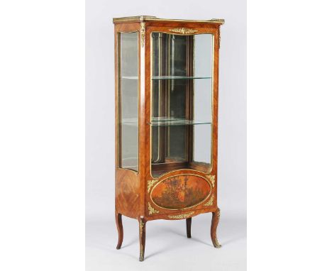 An early 20th century French kingwood and ormolu mounted vitrine, the glazed door inset with a vernis Martin panel, height 15