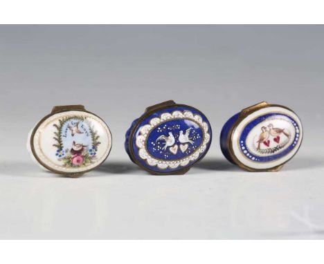 A group of three 18th century South Staffordshire enamel oval patch boxes, the lids all decorated with love birds, width 4.3c
