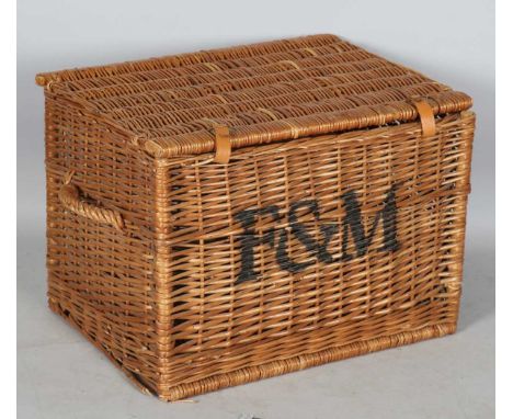 A Fortnum &amp; Mason wicker hamper, bearing stencilled monogram, width 66cm.