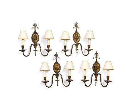 A SET OF FOUR GILT METAL TWIN-BRANCH WALL APPLIQUES IN GEORGE III STYLE 20TH CENTURY 45cm high, 38cm wide, 15cm protuberance 