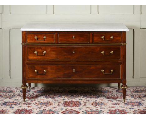 A DIRECTORE MAHOGANY, BRASS AND MARBLE COMMODE  FRENCH, LATE 18TH OR EARLY 19TH CENTURY The top long drawer panelled as three