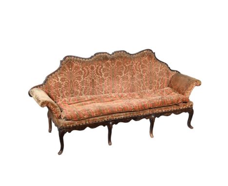 A CONTINENTAL CARVED AND UPHOLSTERED CANAPE PROBABLY ITALIAN, LATE 18TH CENTURY 110cm high, 240cm wide, 69cm deep  Condition 