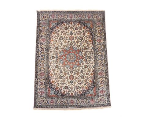 AN ISFAHAN RUG  With signature to one end Approximately 296 x 2024cm   Condition Report:  Overall with signs of only light we