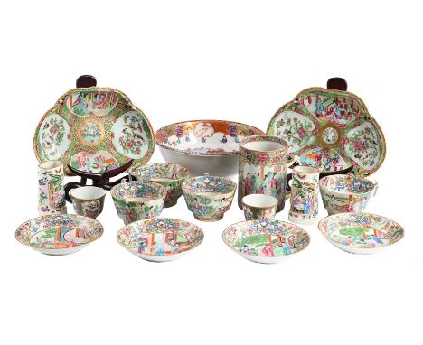 A CHINESE EXPORT PUNCH OR WASH BOWL 18TH CENTURY Decorated in shades of iron-red, blue, green and gilt with figures on a gard