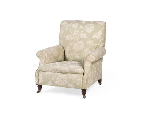 A VICTORIAN MAHOGANY AND UPHOLSTERED ARMCHAIR LATE 19TH CENTURY The casters stamped 'HAMPTON & SONS, PALL MALL', upholstered 