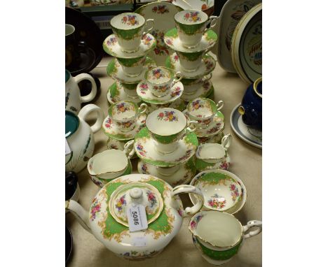 A Paragon Rockingham pattern tea and coffee service, for six, comprising tea cups and saucers, side plates, bread and butter 