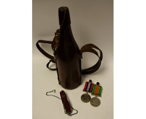 Militaria - WWII medals; a leather cased bottle flask; Swiss army knife (3)