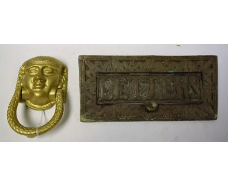 Door Furniture - a large Victorian brass letter box; a door knocker, as a sphinx (2) 