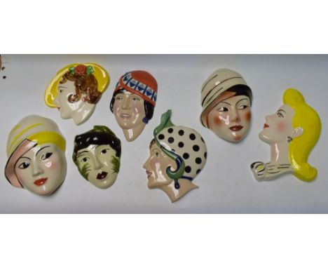 A set of three Art Deco style Crown Devon ceramic wall masks, painted by Dorothy Ann; others Kevin Francis, Moorland, etc (7)