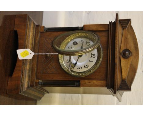 A Junghans mantle clock and a French carriage clock with key 