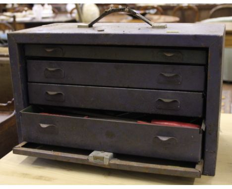 A metal engineers box with tools 