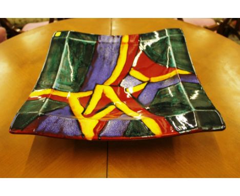 A multicoloured square Poole dish